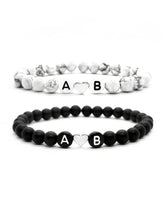 Partnerarmbänder schwarz und Marmor Perlen mit Buchstaben und einem Herz in gold oder silber von Lymaja Jewelry