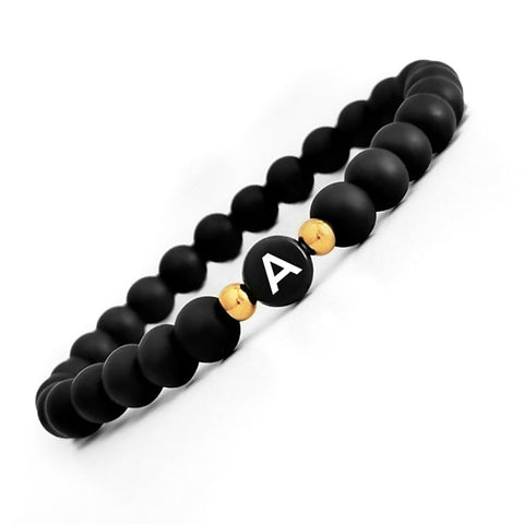 Partnerarmband Black and Gold aus Onyx Natursteinperlen mit Edelstahl Perlen und Acryl Buchstaben personalisiert für Frauen und Männer von Lymaja Jewelry