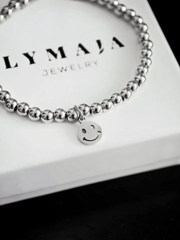 Smiley Perlenarmband in Silber mit 4mm Edelstahl Perlen auf ein Gummiband gezogen